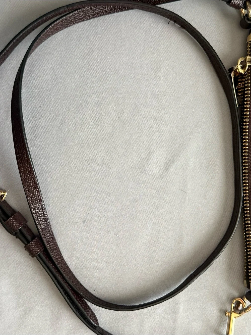 Coach burgundy Pebbled Leather Messenger with Gold Hardware